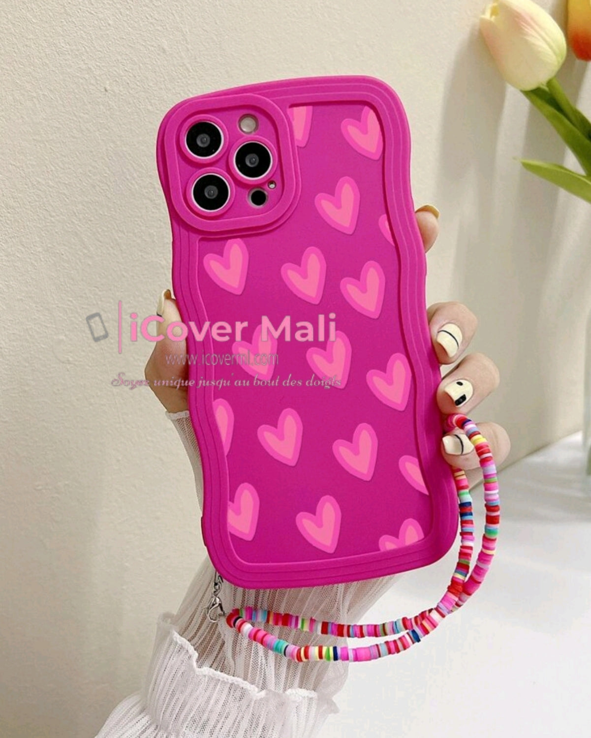 Coque rose motif cœur avec lanière