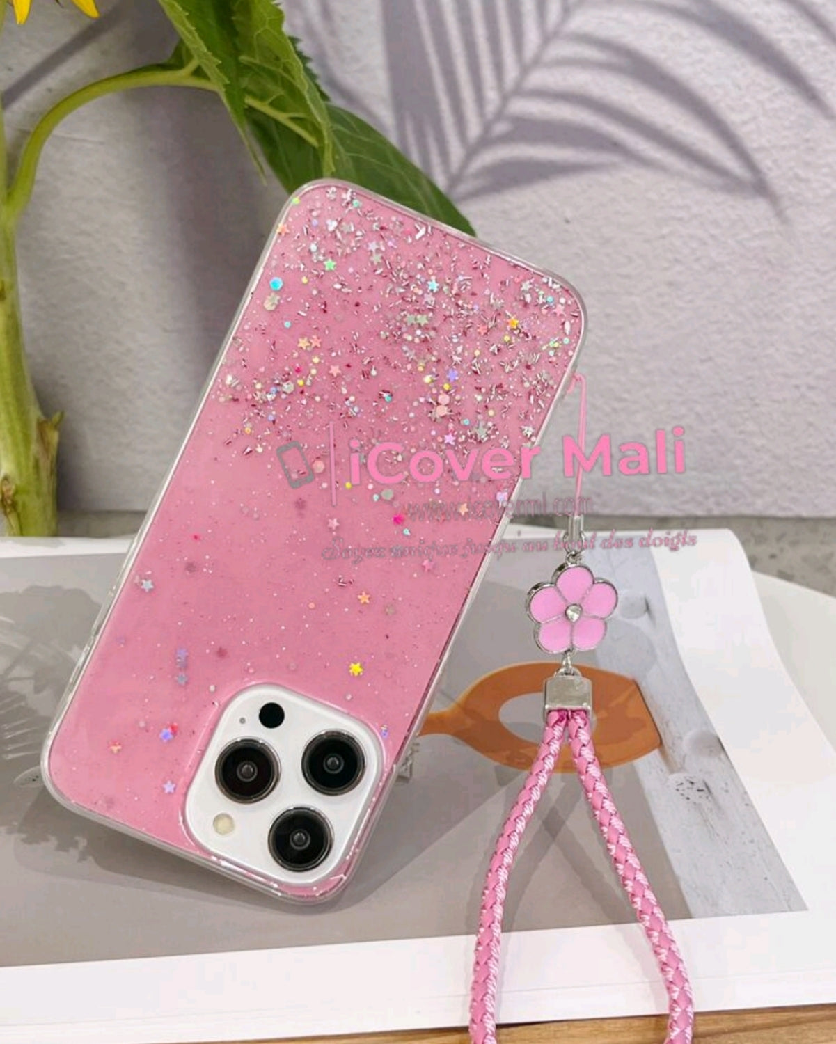 Coque rose à paillettes avec lanière